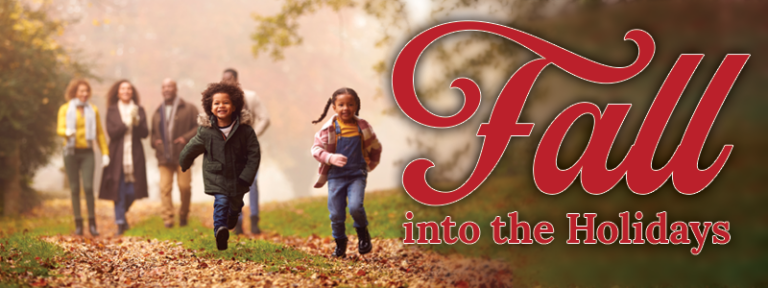 fall into the holidays, family runs down path of fall leaves